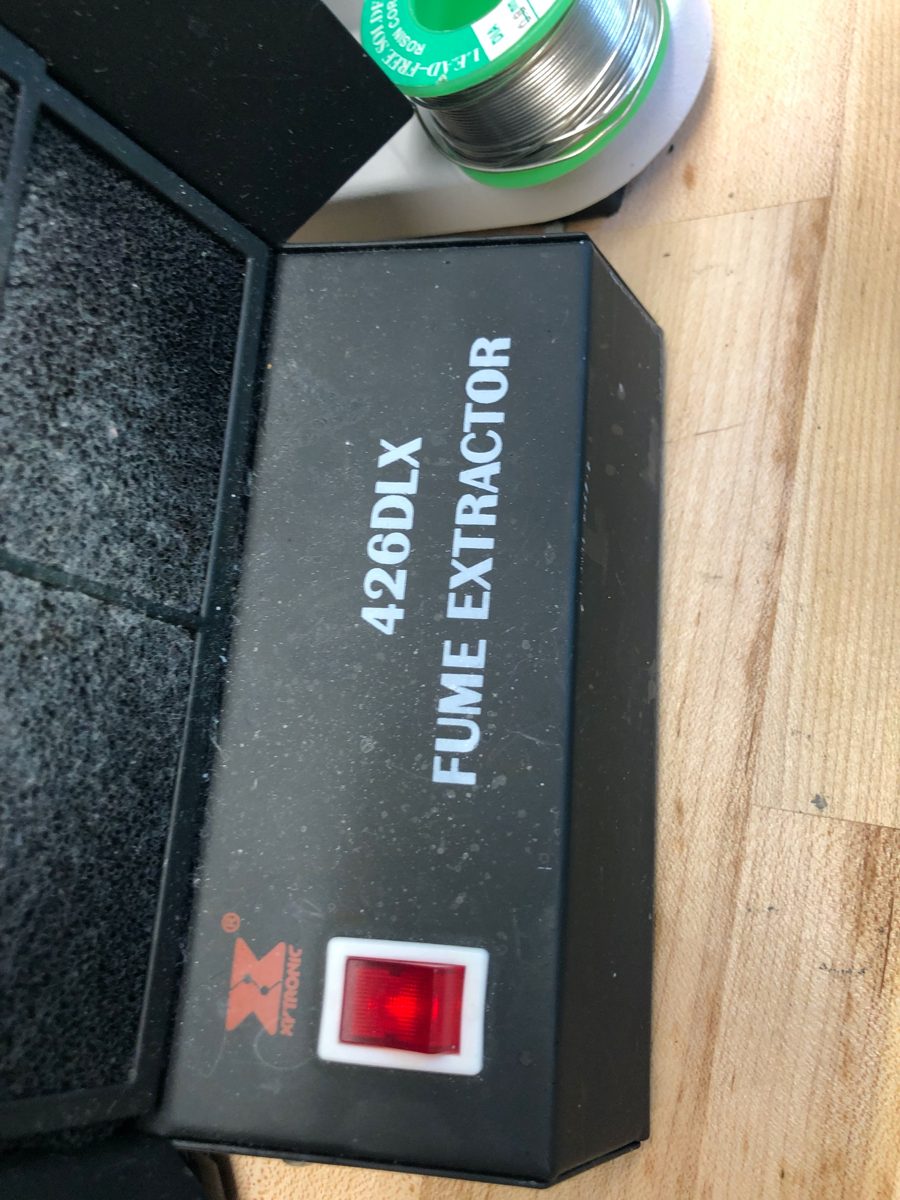 Xytronic 426DLX fume extractor on the bench beside a reel of solder